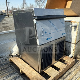 Hoshizaki F330BAH stainless steel flaker ice maker, air-cooled, new condition, visible scratch and dent on side panel, on pallet.