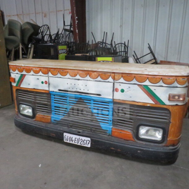 Unique wooden portable car bar on commercial casters, features 6 shelves, dimensions 99x24x43 inches; vibrant paint design.
