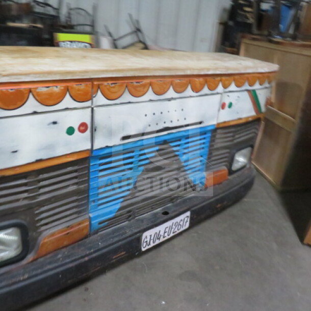 Unique wooden portable "Car Bar" on heavy-duty commercial casters, featuring vibrant paint and under storage with 6 shelves.