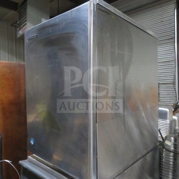 New Hoshizaki KM-515MRH ice maker, stainless steel. Includes remote and manual. Dimensions: 28x22x31 inches. 115 Volt.