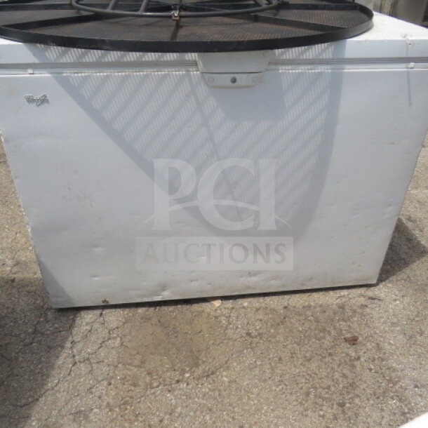 Whirlpool chest freezer, model WZC3115DW00, in working condition. Measures 47x27x34 inches, 115 volts.