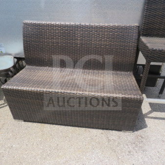 One wicker single-sided booth, brown weave, good condition, sturdy. Ideal for outdoor or indoor seating arrangements.