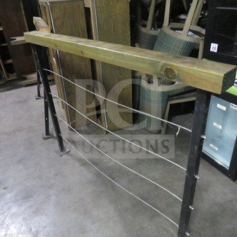 Wood and metal railing, 62x4x43 inches, featuring a wooden top and metal cables, in fair condition.