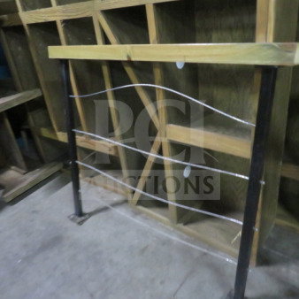 Wood and metal railing, 59.5x4x43 inches, features wooden top rail, metal frame and horizontal cables. Good condition.