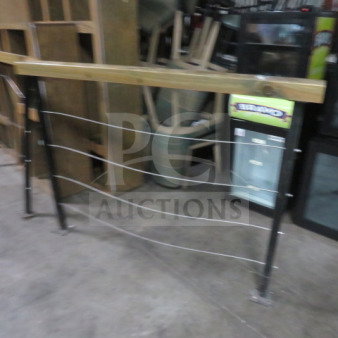 Wood and metal railing, 116x4x43 inches. Features wooden top rail, metal frame with horizontal cables. Good condition.