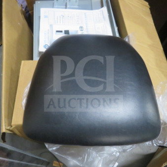 NEW black cushioned seat, model 4XBID, unworn condition, smooth finish, ready for installation.