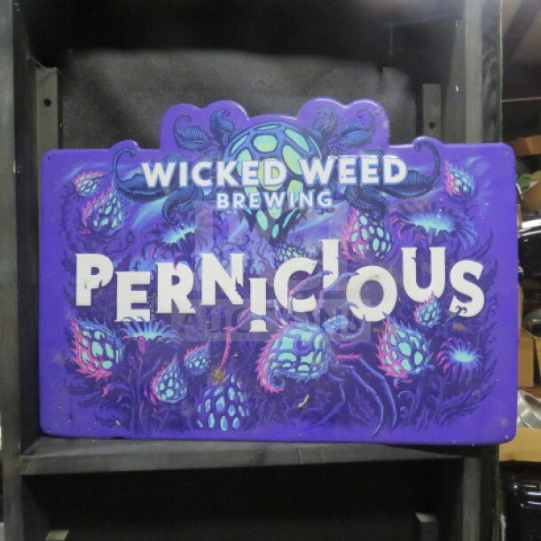 Wicked Weed Brewing Pernicious tin sign, 24x17 inches, vibrant purple and green design, excellent condition.