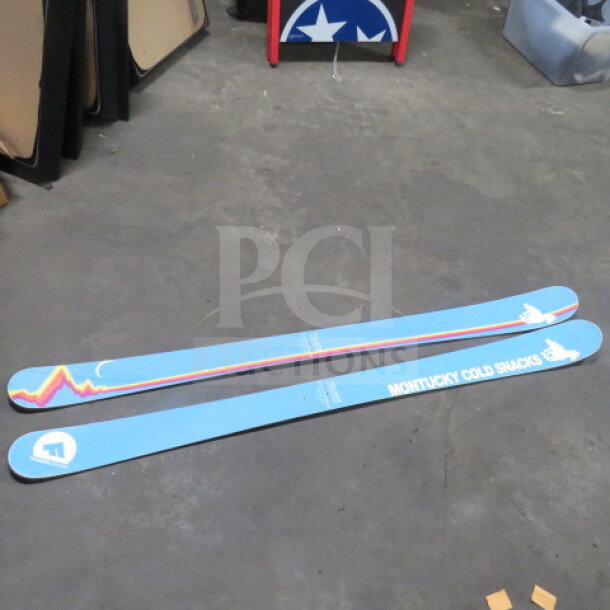 Folsom Custom Skis, Montucky Cold Snacks design, excellent condition, vibrant blue with colorful graphics.