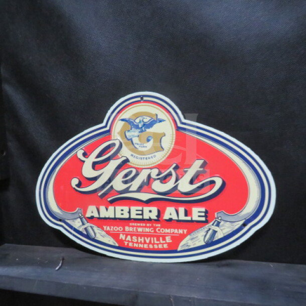 One 14x10 inch Gerst Amber Ale tin sign with embossed lettering, featuring a red and blue color scheme, made by Yazoo Brewing Company, Nashville, Tennessee.