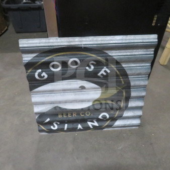 Goose Island tin sign, 23.5"x22.5", corrugated metal, features Goose Island logo. Good condition.