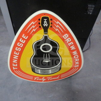Tennessee Brew Works tin sign, 22.5x23.5 inches, featuring guitar design and vibrant colors. Excellent condition.