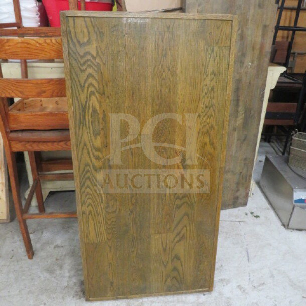 53x26 wooden table top with natural wood grain, rectangular shape, in good condition. Ideal for furniture projects.