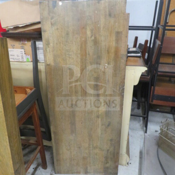 58x23 inch wooden table top, brown finish, used condition.