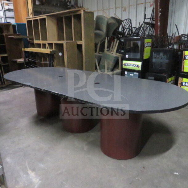 2-piece table with 3 pedestal bases, measures 120x48x30 inches, wood and metal construction, rectangular top.