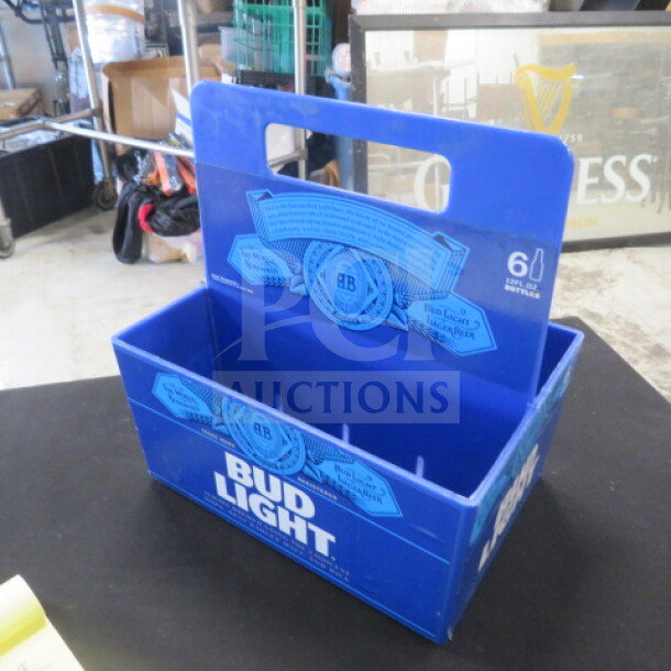Blue Bud Light poly caddy with handle, 6-bottle capacity, branded graphics, used condition, model 9XBID.