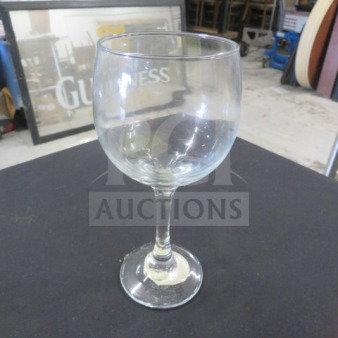 10.5oz wine glass, clear glass, good condition, brand marking visible.