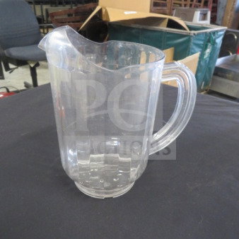 Clear poly pitcher, model 3XBID, with sturdy handle and spout, in good condition, ideal for beverages.