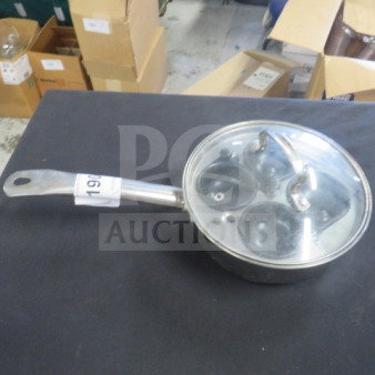 Stainless steel egg poacher pan with clear lid, includes three poaching cups, long handle, gently used condition.