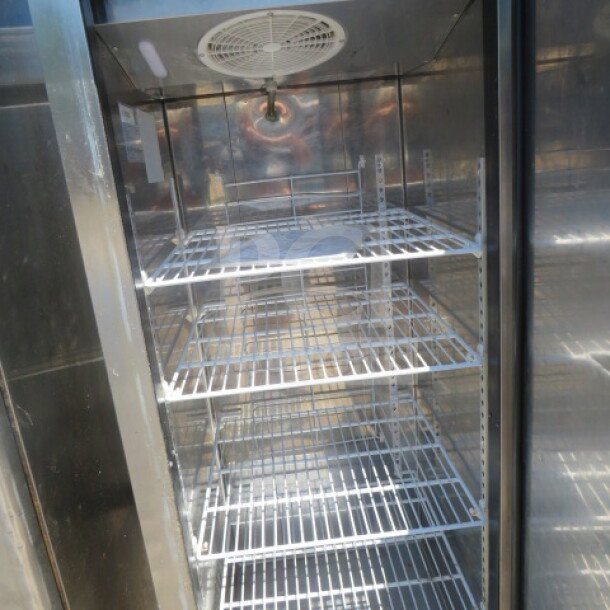 Blue Air BSF23T-HC 1-door freezer with 4 racks; on casters; 27x31x82 inches; 115V; excellent condition; includes manual.