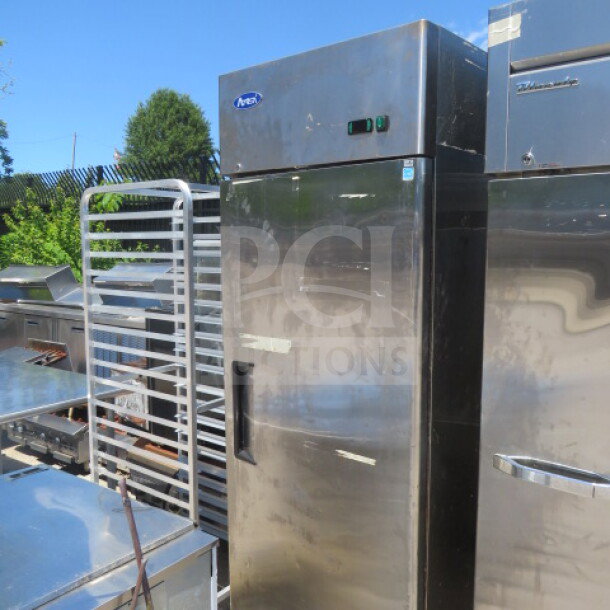 Atosa MBF8001-GR stainless steel 1-door freezer, 3 racks, 28.5x32x82 inches, 115 volt, used condition, exterior view.
