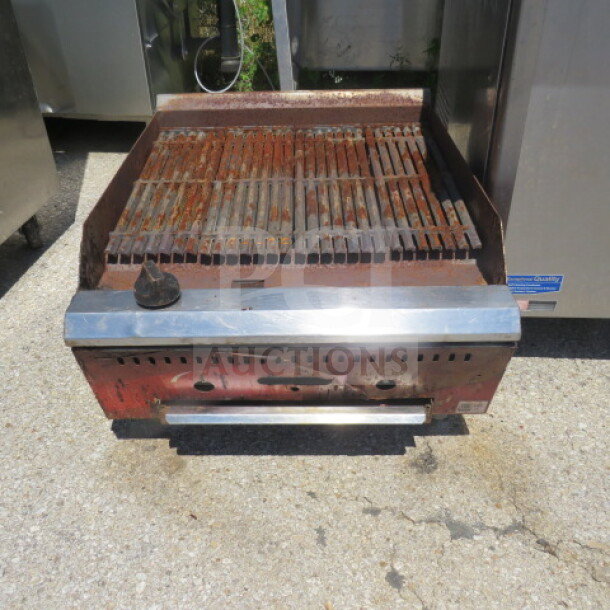 Avantco natural gas charbroiler Model 177CAG24RC, 24x29x16 inches, used condition, rust on grill surface.