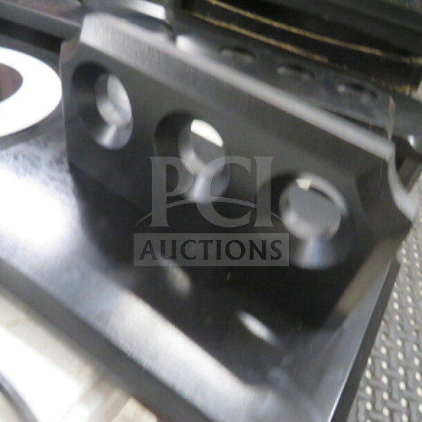 Black wooden pool cue holder, new, with multiple slots. Assembly required.