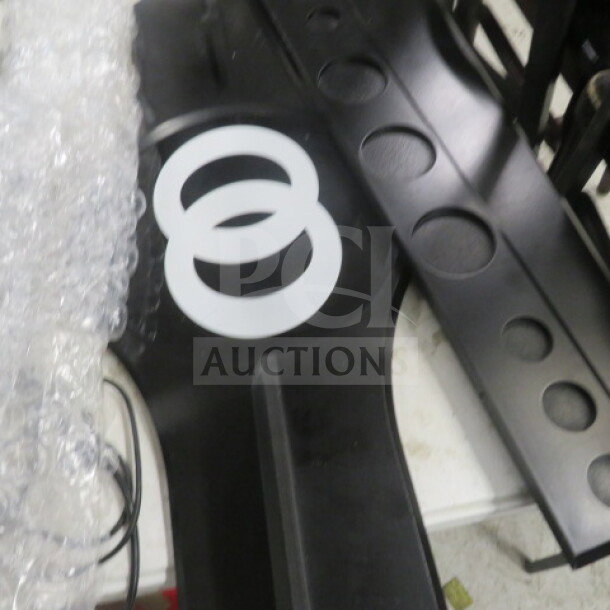New wooden pool cue holder, black finish, requires assembly, features round cutouts for cues, white circle design.