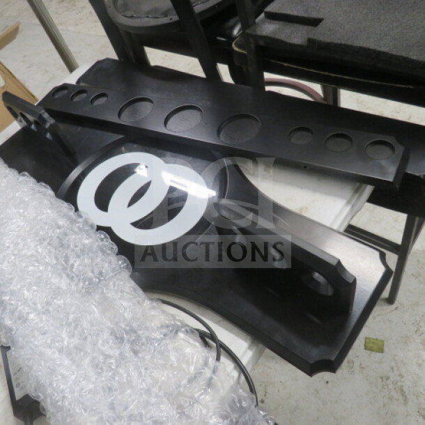 New wooden pool cue holder, disassembled parts, sleek black finish, requires assembly, features multiple cue slots.
