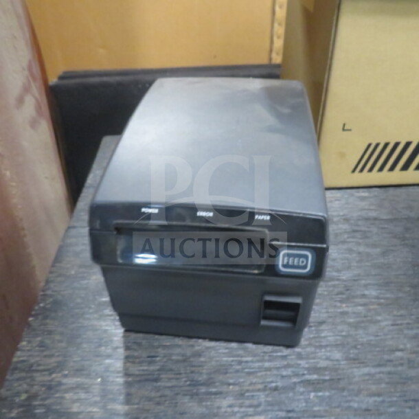 Bixolon PR10490 thermal printer, compact design, black finish, visible feed button, and status indicators.