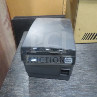 Bixolon PR10490 thermal printer, compact design, black finish, visible feed button, and status indicators.