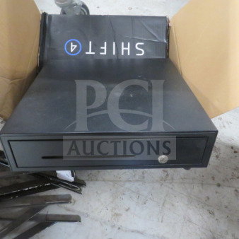 Black cash drawer with key slot and front bill slot. Displayed with Shift4 branding. Appears in good condition.