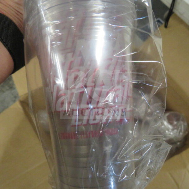 Clear Natural Lite cup in plastic wrapping, showing the logo and brand text. Cups appear unused and in original packaging.