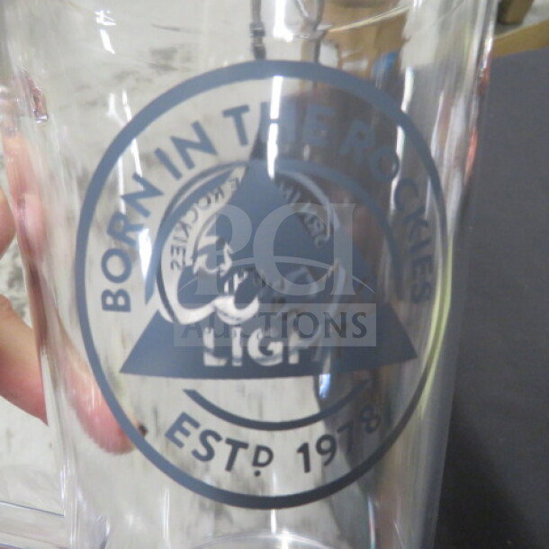 NEW 32oz Coors Light poly pitcher with "Born in the Rockies" logo and "Est. 1978" marking, in pristine condition.