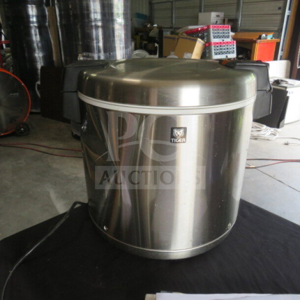Tiger 50 Cup Rice Warmer, Model THC-90UA, stainless steel, 120 Volt, excellent condition, working, Tiger logo visible.