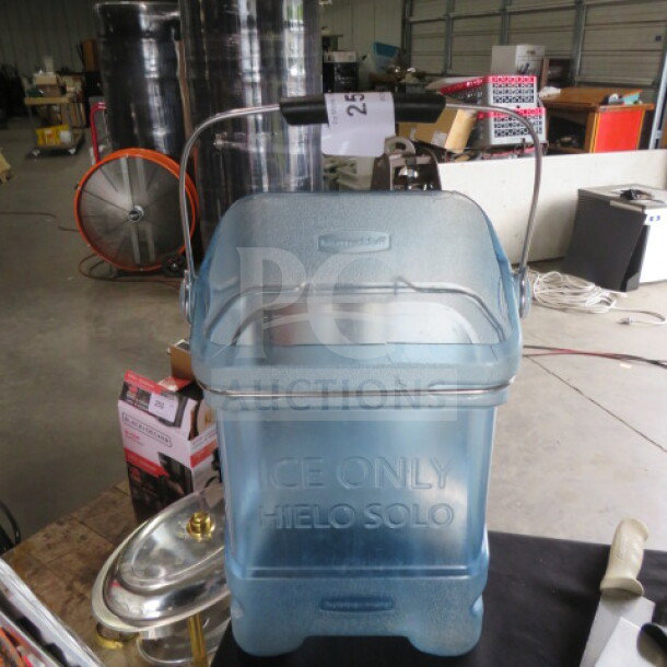 Rubbermaid ice bucket, translucent blue, labeled "ICE ONLY, HIELO SOLO," metal handle, excellent condition.