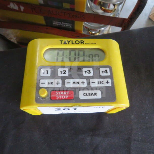 Taylor Digital 4 Channel Timer Model 5839N, yellow casing, visible start/stop and clear buttons, good condition.