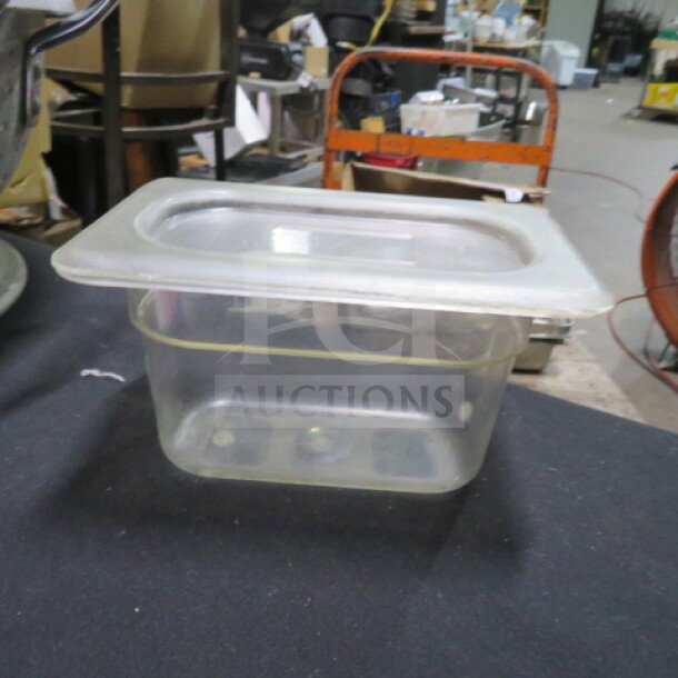 1/9 size, 4-inch deep food storage container with lid, clear plastic, used condition, stackable, model 5XBID.