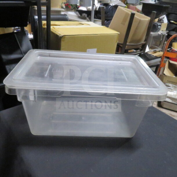 Clear 4.75-gallon food storage container with lid, in good condition. Durable plastic, ideal for bulk storage.