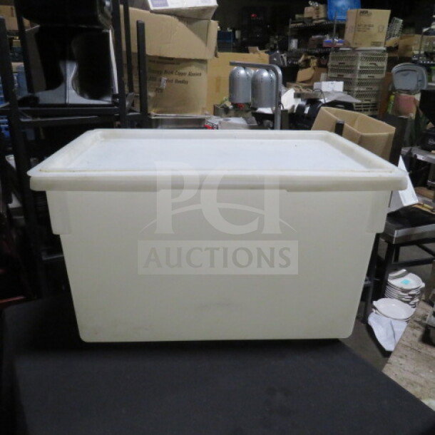 22-gallon food storage container with lid, white, in used condition, suitable for bulk storage.