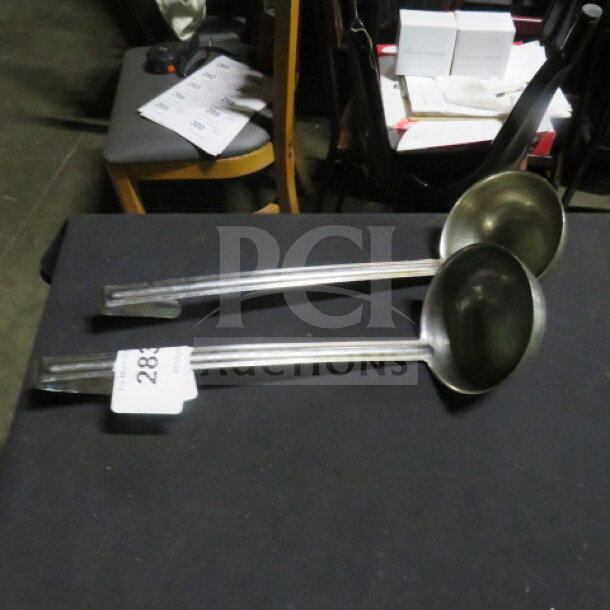 Two 12oz stainless steel ladles in good condition with long handles, showing tag marked "288."
