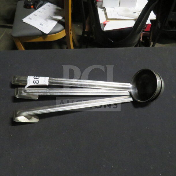4oz stainless steel ladle, excellent condition, with long handle and hook end for easy storage.