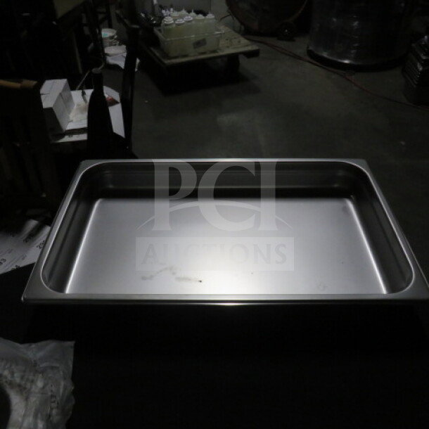 New full-size 2.5-inch deep hotel pan, stainless steel, ideal for commercial kitchens. Pristine condition, no visible markings.