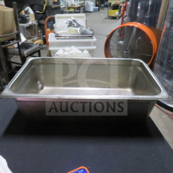 Stainless steel full size 6-inch deep hotel pan in good condition, ideal for catering or restaurant use.