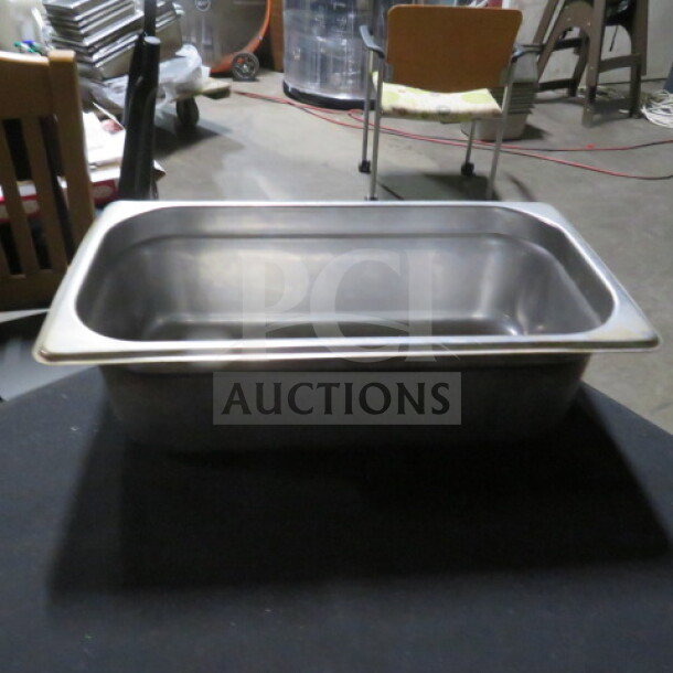 1/3 Size 4 Inch Deep Hotel Pan, stainless steel, good condition, suitable for commercial kitchen use, marked 3XBID.