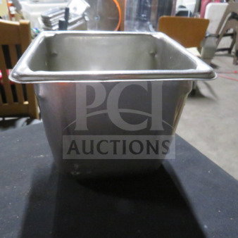 Stainless steel hotel pan, 1/6 size, 6-inch deep. Slightly used condition. No visible markings or labels.