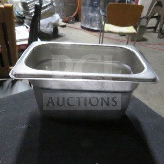 1/9 Size 4 Inch Deep Hotel Pan, stainless steel, good condition. Ideal for food service, catering, and storage.