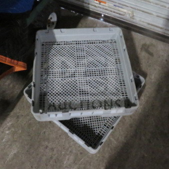 Flatware dishwasher rack in good condition, model 2XBID, features a durable mesh design for efficient cleaning.