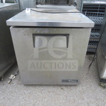 True TUC27F-LP-HC worktop freezer, single door, 27.5x30x32 inches, stainless steel, on casters, not cooling.