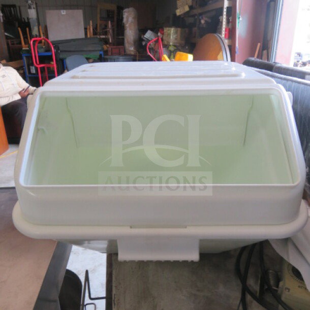 White ingredient bin without lid, rectangular, plastic, and in used condition, ideal for kitchen storage.