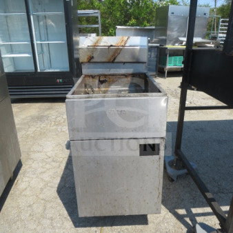Anets SLG100 70lb natural gas deep fryer, stainless steel, 19.5x31x46.5 inches, used condition, visible grease stains.